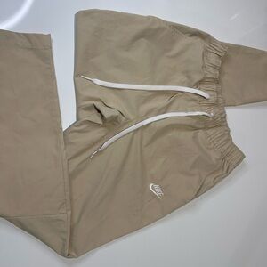 Nike Track Pants in Beige with White Accents